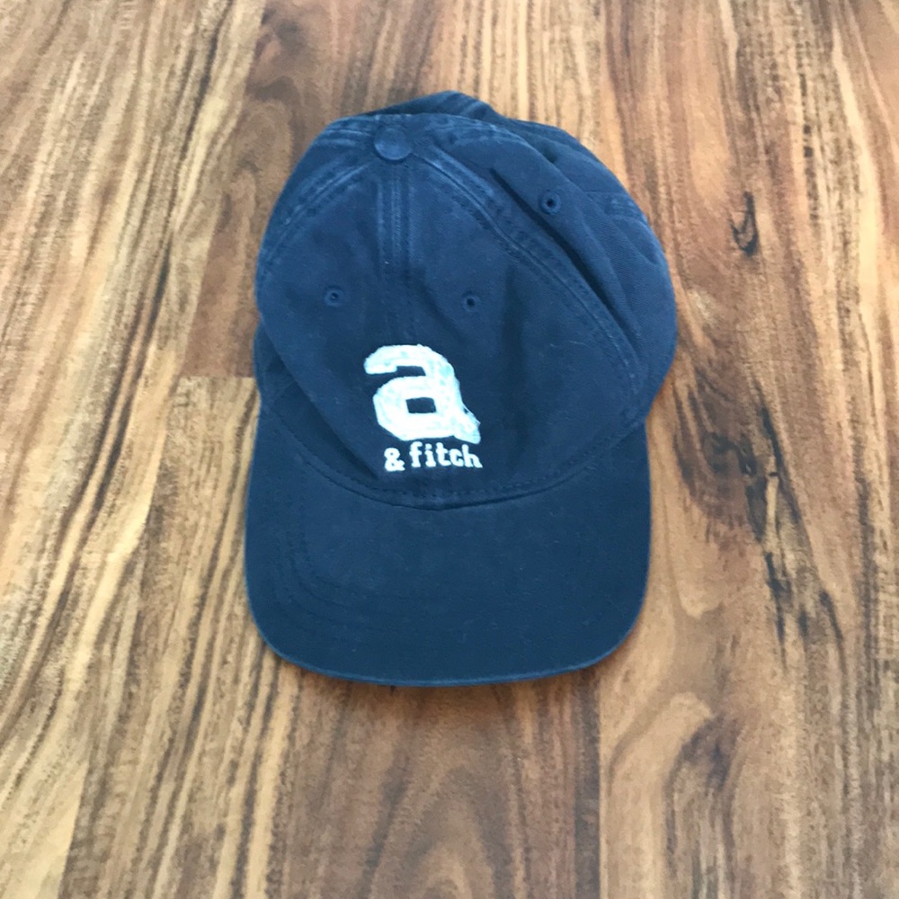 Abercrombie and Fitch; navy hat; silver shiny logo